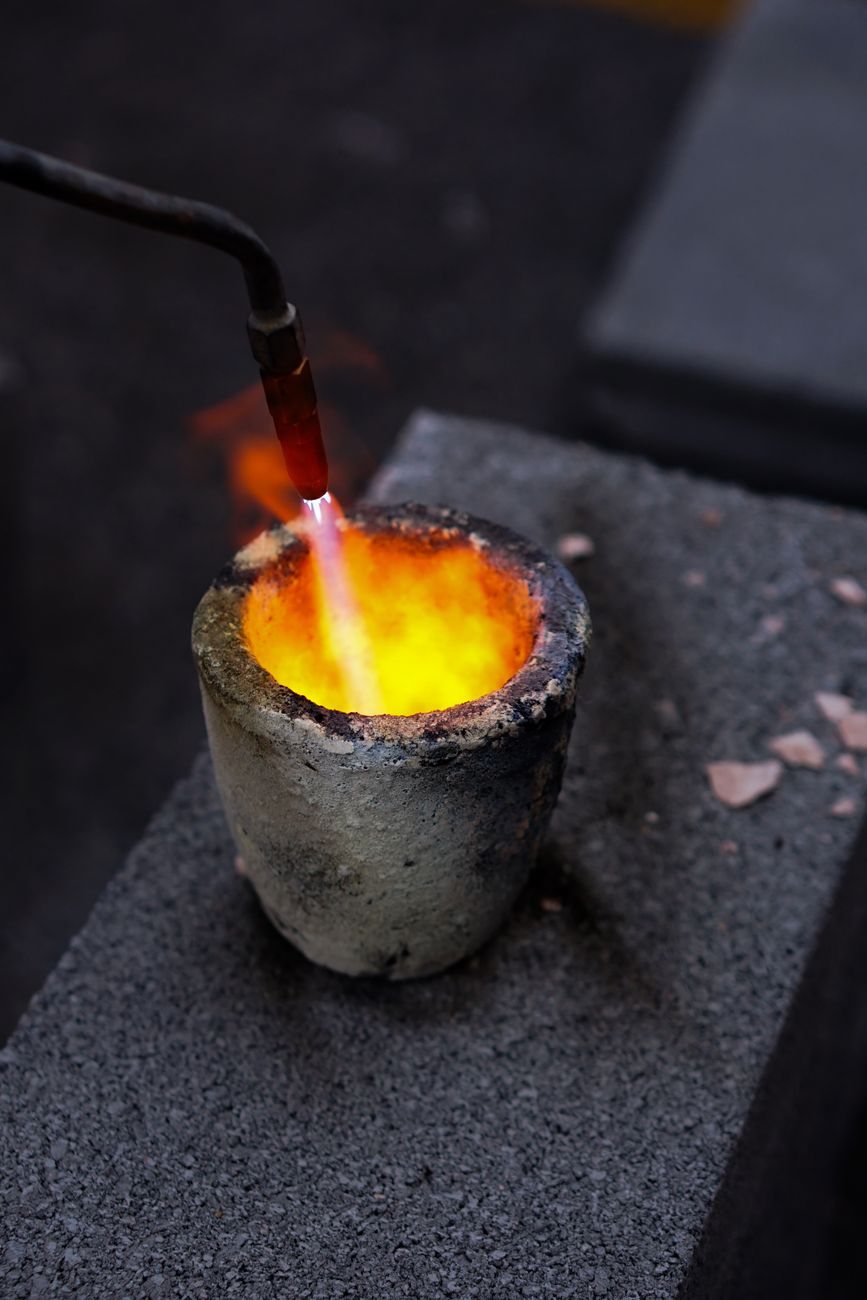 close up of flame in a crucible