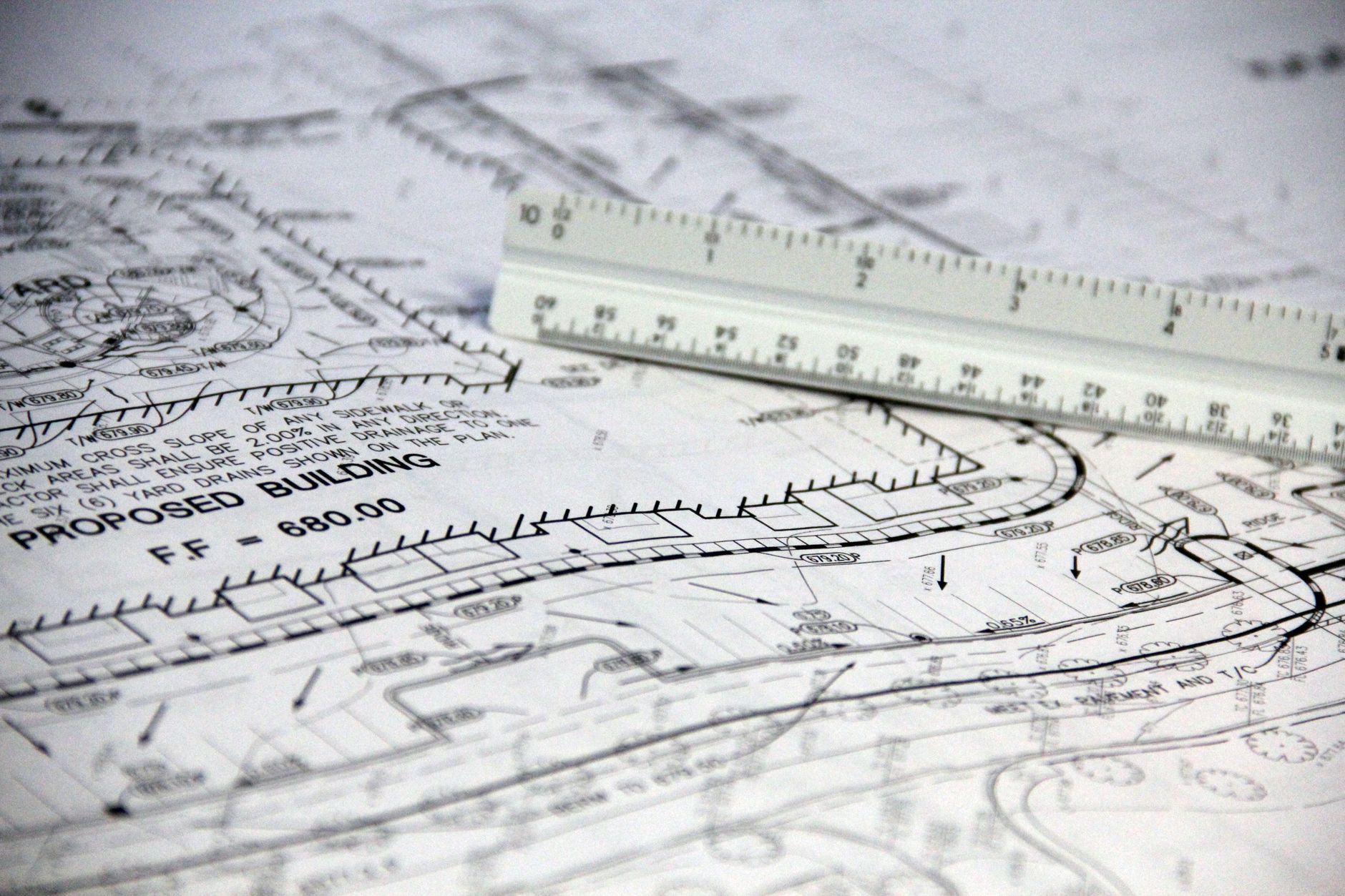 white ruler on white printed paper