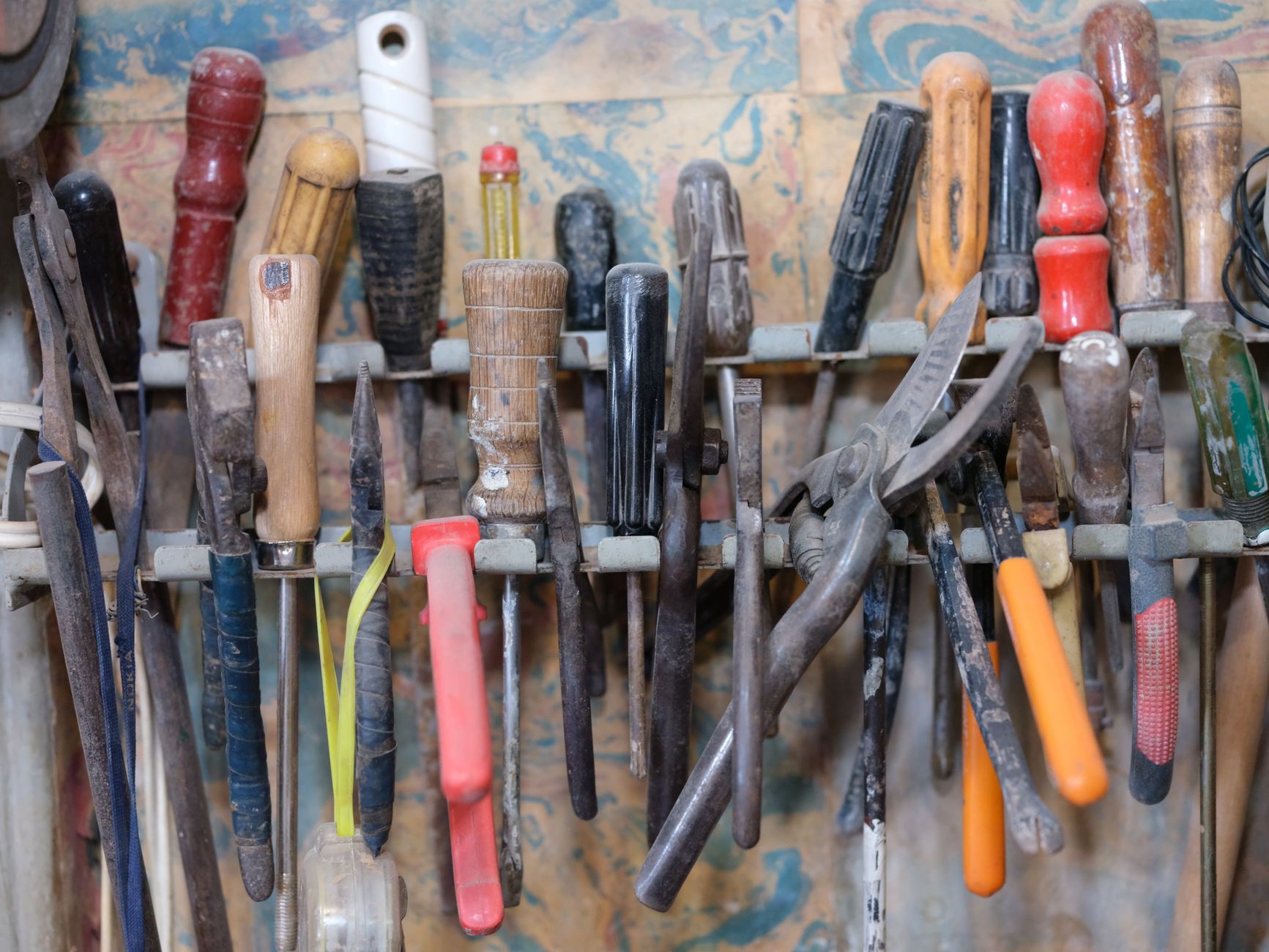 organized tools on workshop rack