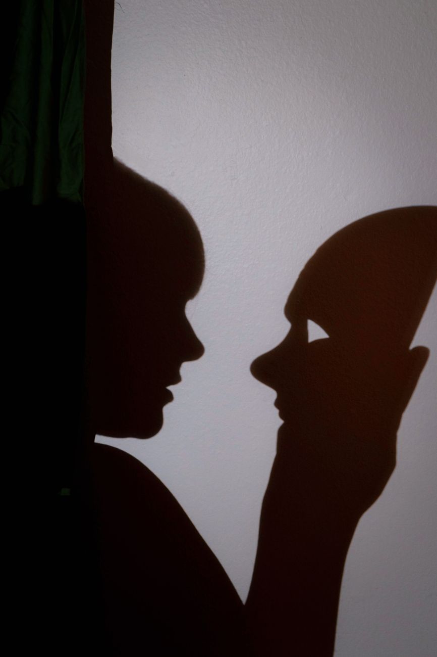 shadow art silhouette with mask and face